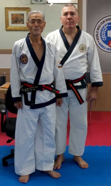 File:Senior-grandmaster-choi-hee-suk-dan-3-and-grandmaster-carlos-alayon-after-8th-dan-test-october-27-2013-moo-duk-kwan-hq-seoul-south-korea.jpeg