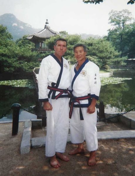 File:Master-carlos-alayon-and-his-teacher-grandmaster-kim-chun-sik-seoul-korea-summer-training-2001.jpg